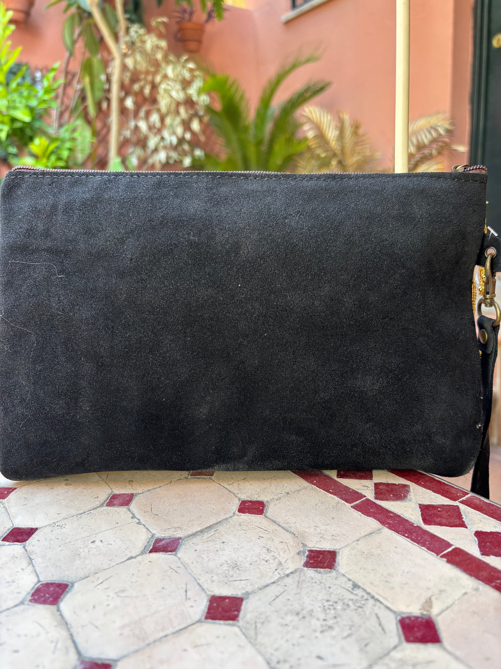 Cartera flecos dorados