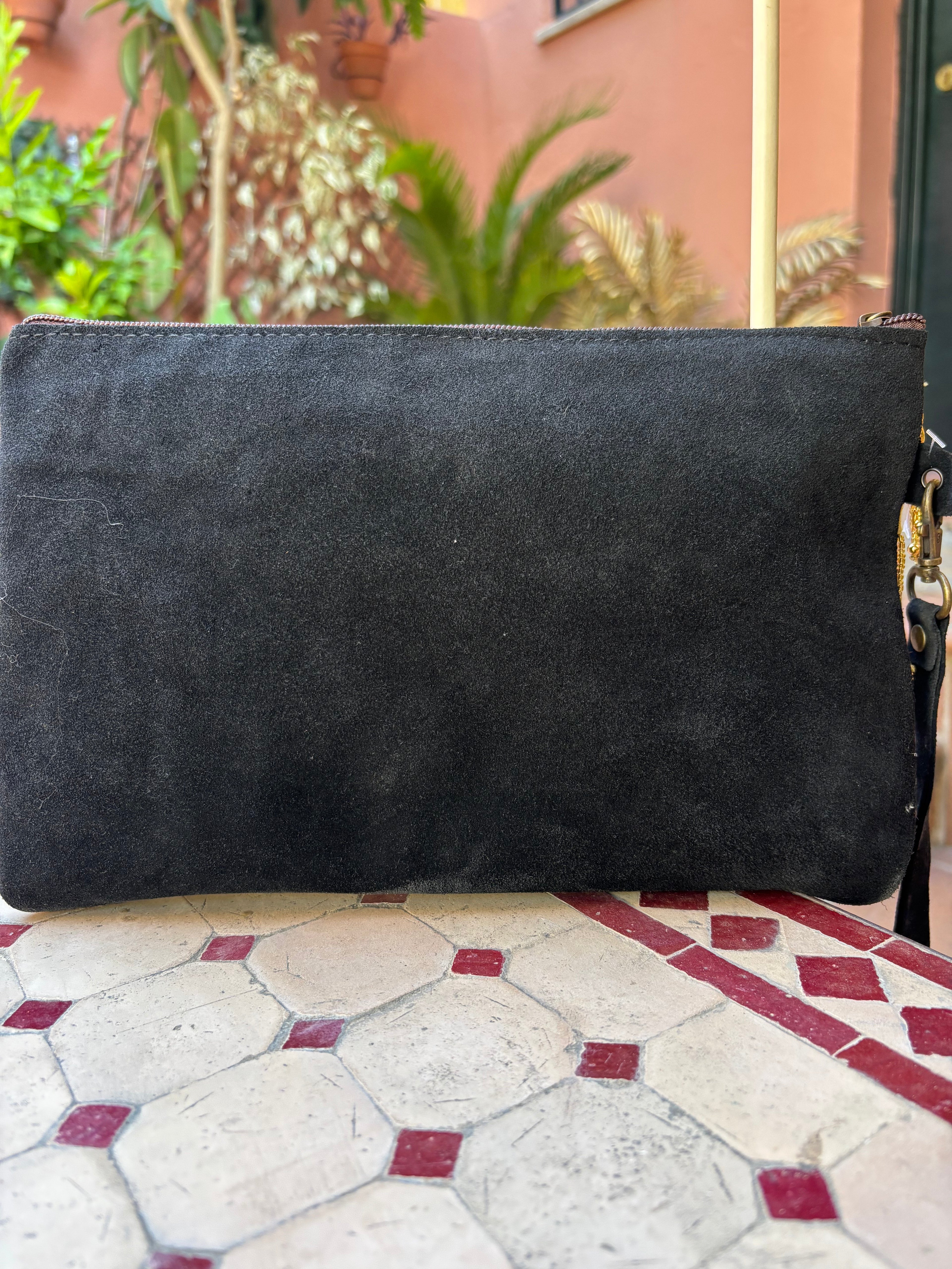 Cartera flecos dorados
