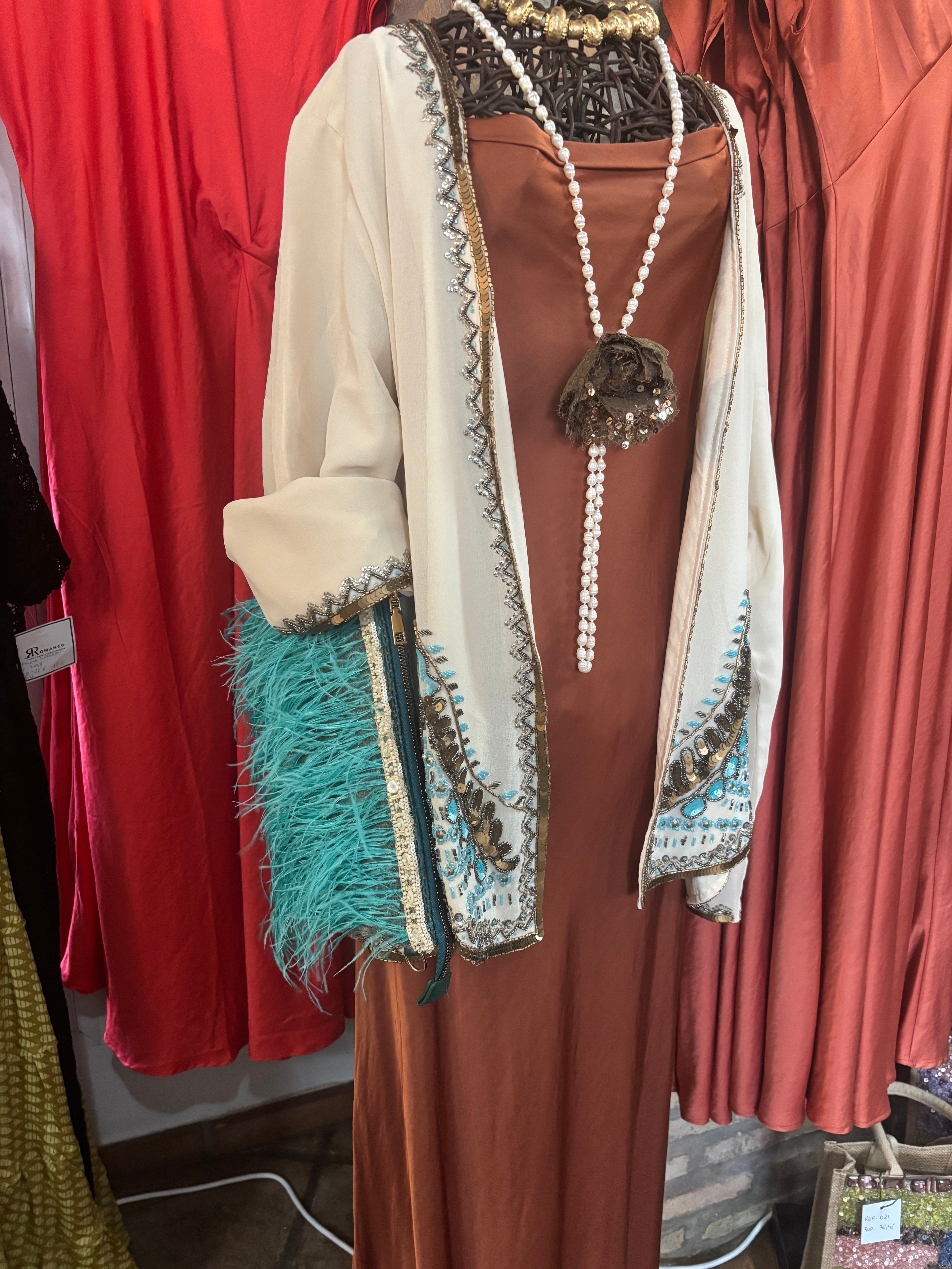 BOLSO PLUMA TURQUESA