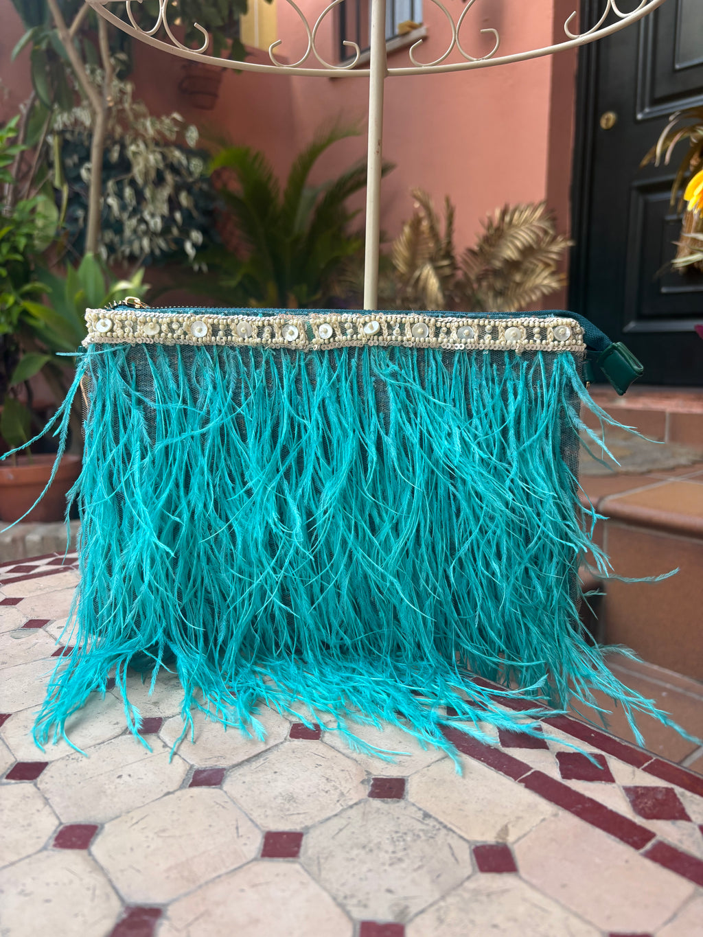 BOLSO PLUMA TURQUESA