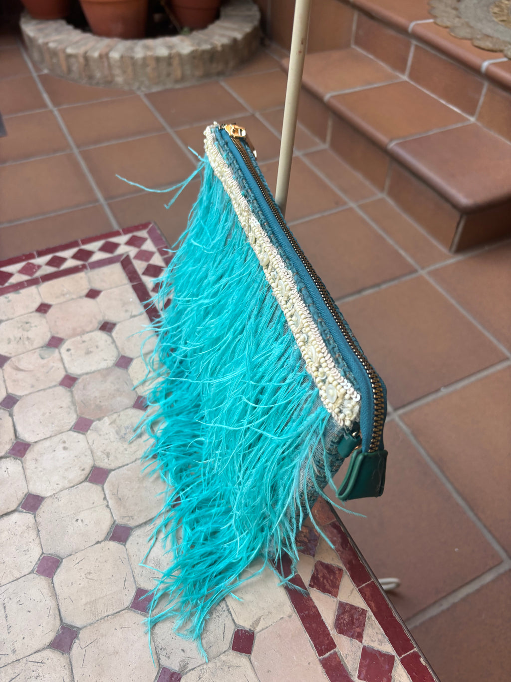 BOLSO PLUMA TURQUESA