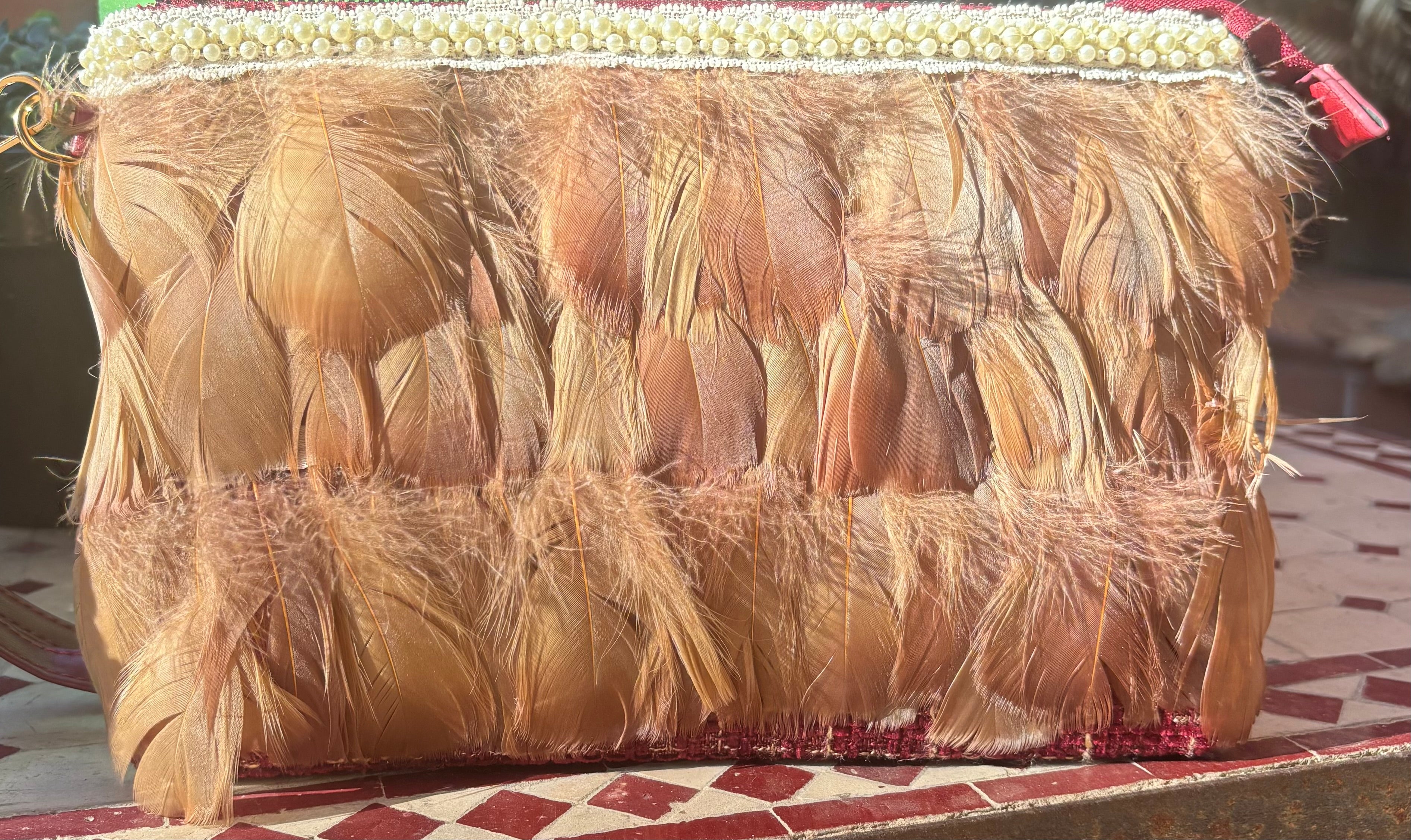 CARTERA PLUMAS Y PERLAS